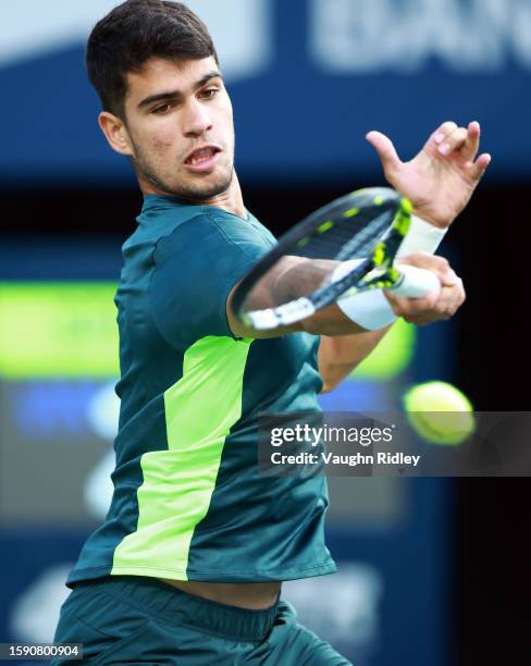 Carlos Alcaraz of Spain hits a shot against Hubert Hurkacz of Poland during Day Four of the National Bank Open, part of the Hologic ATP Tour, at...