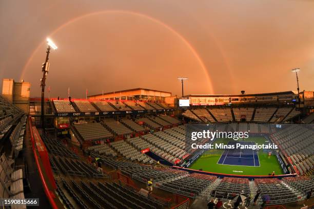 Rainbow is seen over centre court after play was suspended due to rain on Day 4 during the National Bank Open at Stade IGA on August 10, 2023 in...