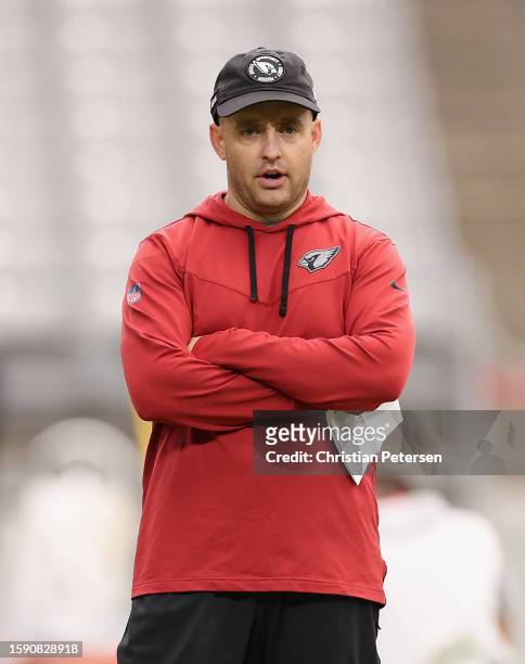 Offensive coordinator Drew Petzing of the Arizona Cardinals participates in a team practice ahead of the NFL season at State Farm Stadium on August...