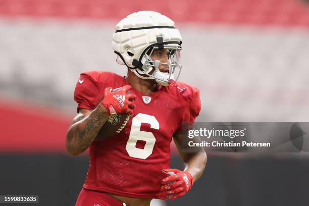 Running back James Conner of the Arizona Cardinals participates in a team practice ahead of the NFL season at State Farm Stadium on August 03, 2023...