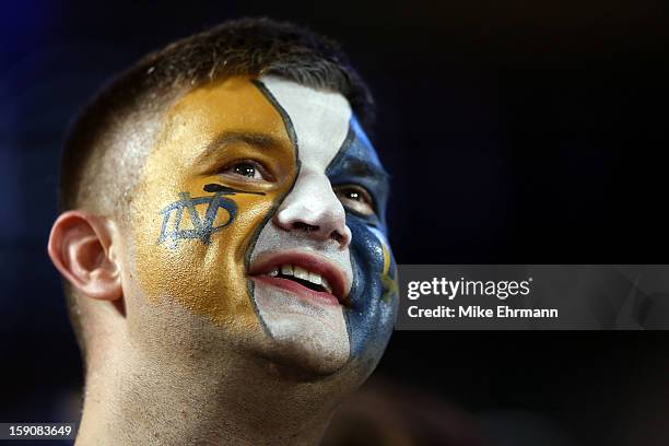 Fan of the Notre Dame Fighting Irish looks on prior to the 2013 Discover BCS National Championship game between the Alabama Crimson Tide and the...