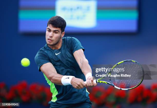 Carlos Alcaraz of Spain hits a double backhand against Hubert Hurkacz of Poland during Day Four of the National Bank Open, part of the Hologic ATP...