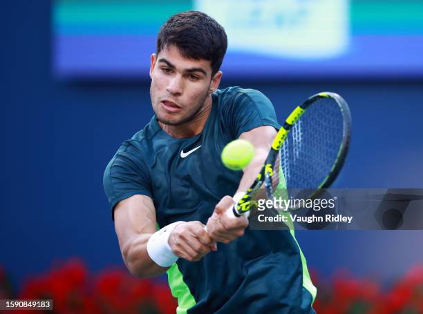 Carlos Alcaraz of Spain hits a double backhand against Hubert Hurkacz of Poland during Day Four of the National Bank Open, part of the Hologic ATP...