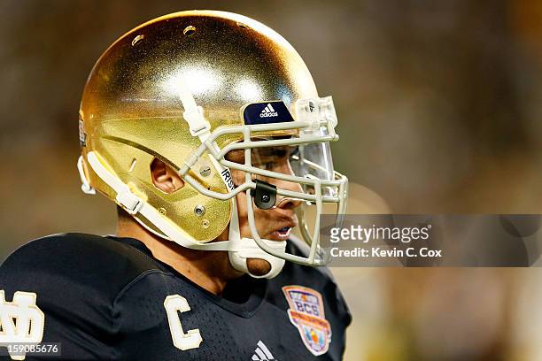 Manti Te'o of the Notre Dame Fighting Irish warms up prior to playing against the Alabama Crimson Tide in the 2013 Discover BCS National Championship...