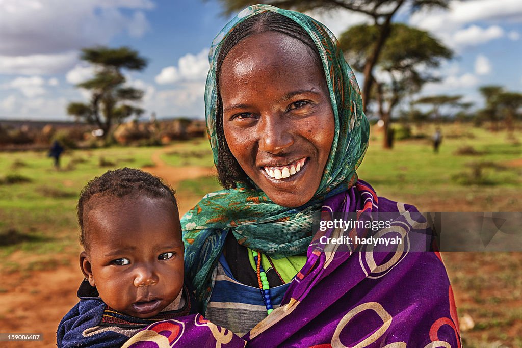 Woman from Borana tribe holding her baby, Ethiopia, Africa