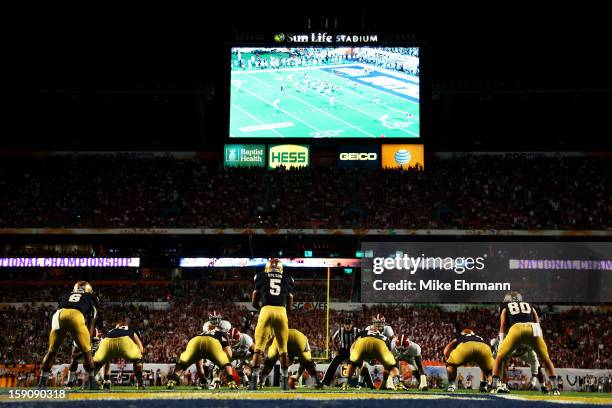 Everett Golson of the Notre Dame Fighting Irish sits undering center against the Alabama Crimson Tide during the 2013 Discover BCS National...