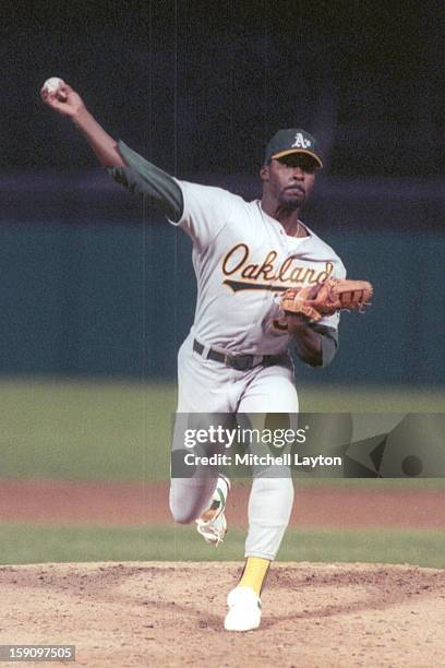 Dave Stewart of the Oakland Athletics pitches during a baseball game against the Baltimore Orioles on April 24, 1990 at Memeorial Stadium in...