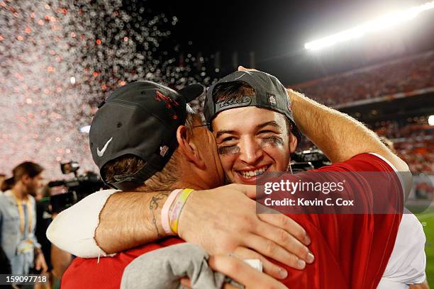 McCarron of the Alabama Crimson Tide celebrates after defeating the Notre Dame Fighting Irish by a score of 42-14 to win the 2013 Discover BCS...