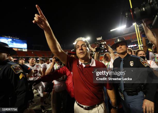 Head coach Nick Saban of the Alabama Crimson Tide celebrates defeating the Notre Dame Fighting Irish in the 2013 Discover BCS National Championship...