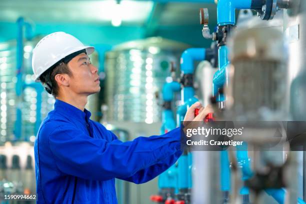 failure modes and effects analysis (fmea): the heart of an equipment maintenance plan - work overalls stock pictures, royalty-free photos & images