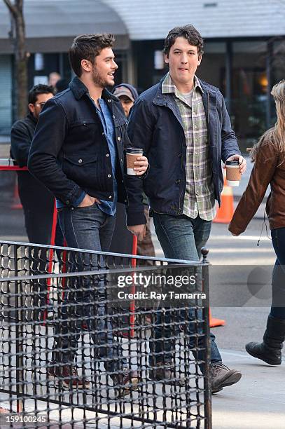 Actors Zac Efron and Miles Teller film a scene at the "Are We Officially Dating?" movie set in Grammercy Park on January 7, 2013 in New York City.