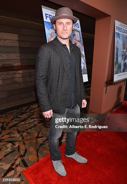 Actor Christopher Stills arrives to the premiere of Salient Media's "Freeloaders" at Sundance Cinema on January 7, 2013 in Los Angeles, California.