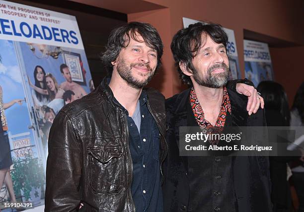 Writer Dave Gibbs and musician Chris Seefriedarrive to the premiere of Salient Media's "Freeloaders" at Sundance Cinema on January 7, 2013 in Los...