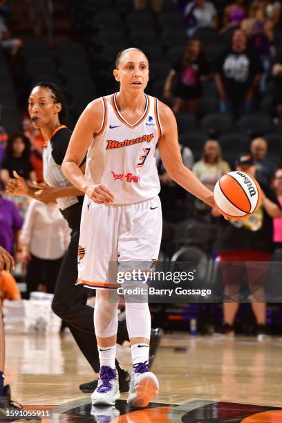 Diana Taurasi of the Phoenix Mercury looks to pass the ball during the game against the Connecticut Sun on August 10, 2023 at Footprint Center in...