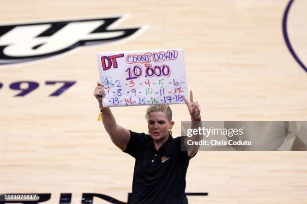 Fan holds a sign during the first half of the game between the Phoenix Mercury and the Atlanta Dream at Footprint Center on August 03, 2023 in...