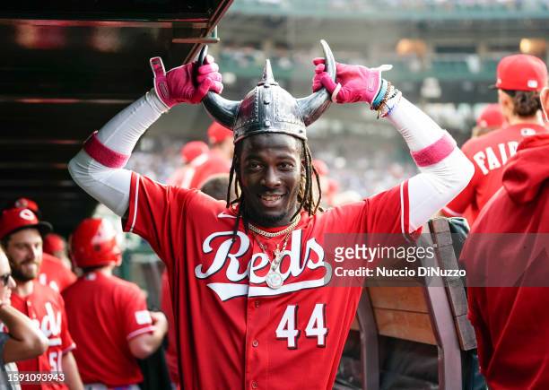 Elly De La Cruz of the Cincinnati Reds celebrates in the dugout after hitting a solo home run during the first inning of a game against the Chicago...