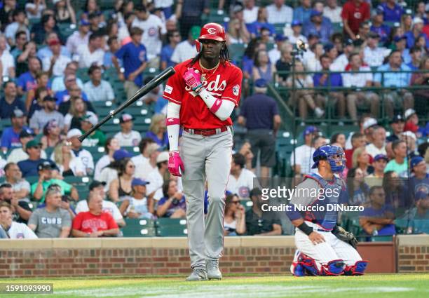 Elly De La Cruz of the Cincinnati Reds celebrates after hitting a solo home run during the first inning of a game against the Chicago Cubs at Wrigley...