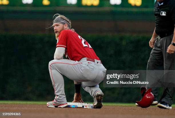 Jake Fraley of the Cincinnati Reds reacts after stealing second during the first inning of a game against the Chicago Cubs at Wrigley Field on August...