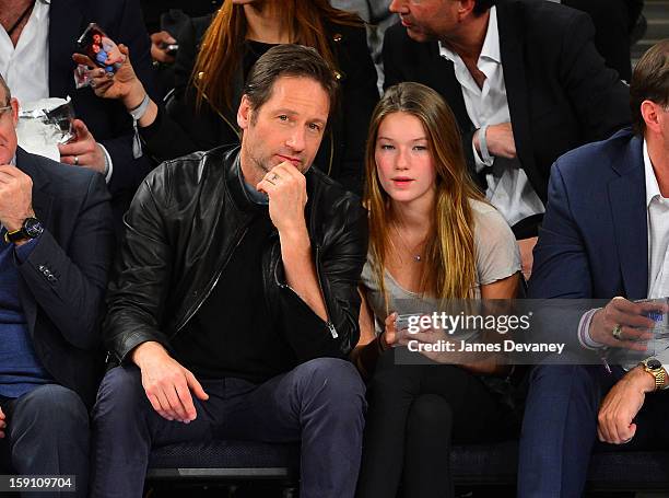 David Duchovny and Madelaine Duchovny attend the Boston Celtics vs New York Knicks game at Madison Square Garden on January 7, 2013 in New York City.