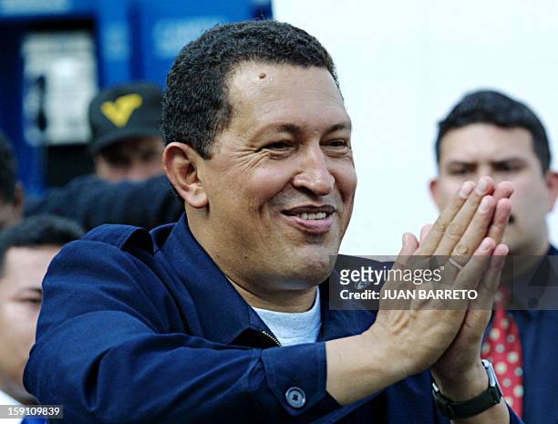 The President of Venezuela Hugo Chavez speaks with some of the voters in the voting centers for the municipal elections and the referendum in...
