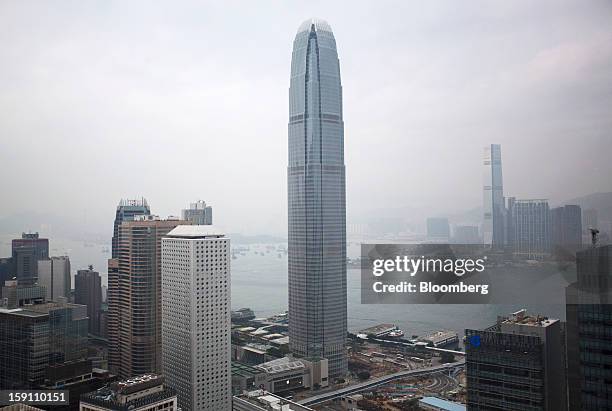 Two International Finance Center , center, stands in the central business district of Hong Kong, China, on Friday, Jan. 4, 2013. Hong Kong topped the...