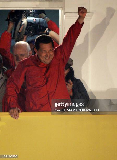 Venezuelan President Hugo Chavez celebrates his victory in the presidential election, 03 December 2006 in Caracas. Chavez won a landslide...