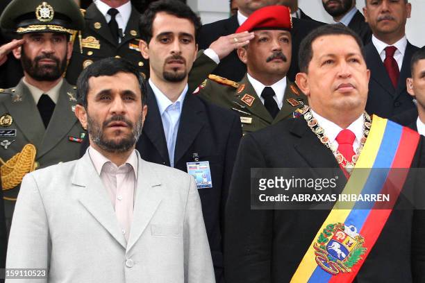 Venezuelan President Hugo Chavez receives his Iranian counterpart Mahmoud Ahmadinejad at the Miraflores Presidential Palace in Caracas, 13 January...