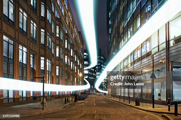 superfast broadband - urban road night stock pictures, royalty-free photos & images