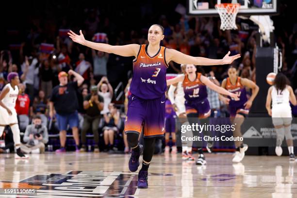 Guard Diana Taurasi of the Phoenix Mercury reacts after scoring her 10,000th career point during the second half against the Atlanta Dream at...