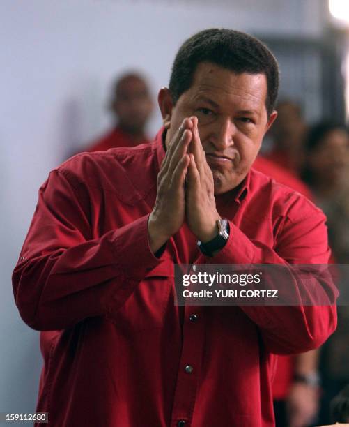 Venezuelan president Hugo Chavez gestures after voting at a polling station during the constitutional referendum, 02 December 2007, in Caracas....