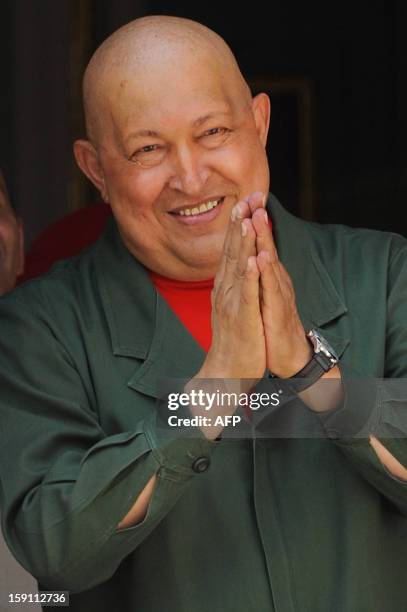 Venezuelan President Hugo Chavez gestures at the Miraflores presidential palace in Caracas on October 1, 2011. Chavez said Saturday that he is...