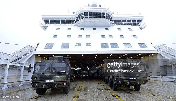 Parts of a Patriot anti-missile system are being loaded onto a ship for transport to Turkey on January 8, 2013 in Travemunde, Germany. Germany is...