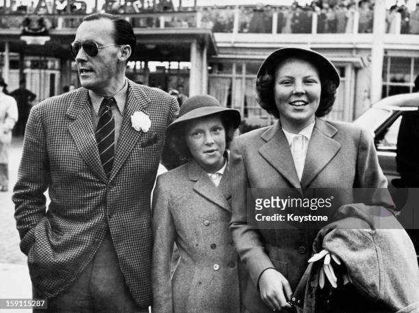 Princess Beatrix , later Queen Beatrix of the Netherlands, and her sister Princess Irene arrive at Amsterdam airport after a holiday in Canada and...
