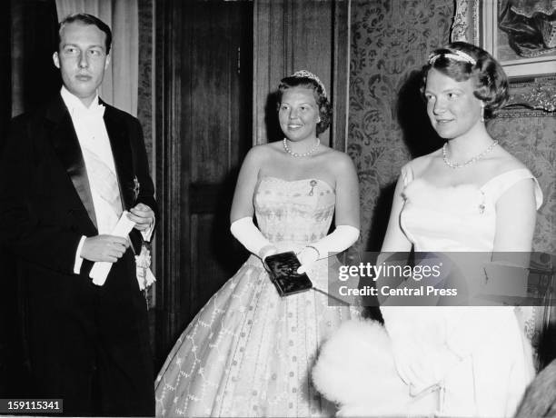 Princess Beatrix , later Queen Beatrix of the Netherlands with her sister Princess Irene at a court ball at the royal palace in Brussels, Belgium,...