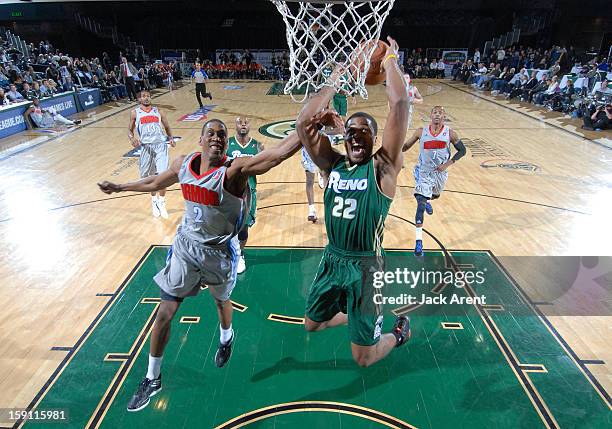 Dar Tucker of the Reno Bighorns slam dunks the ball against the Springfield Armor during the 2013 NBA D-League Showcase on January 7, 2013 at the...