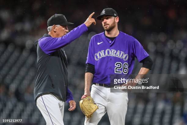 Austin Gomber of the Colorado Rockies reacts as Bud Black of the Colorado Rockies makes a pitching change in the seventh inning against the San Diego...