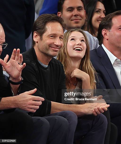 Actor David Duchovny and his daughter Madeline take in the game between the New York Knicks and the Boston Celtics at Madison Square Garden on...