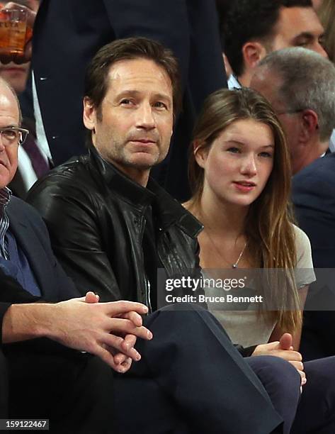 Actor David Duchovny and his daughter Madeline take in the game between the New York Knicks and the Boston Celtics at Madison Square Garden on...