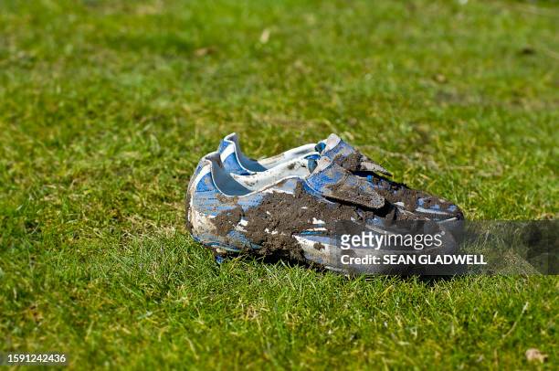 muddy soccer boots - studded footwear stock pictures, royalty-free photos & images