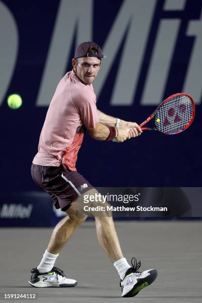 Tommy Paul of the United States returns a shot to Alex De Minaur of Australia during the Mifel Tennis Open by Telcel Oppo at Cabo Sports Complex on...