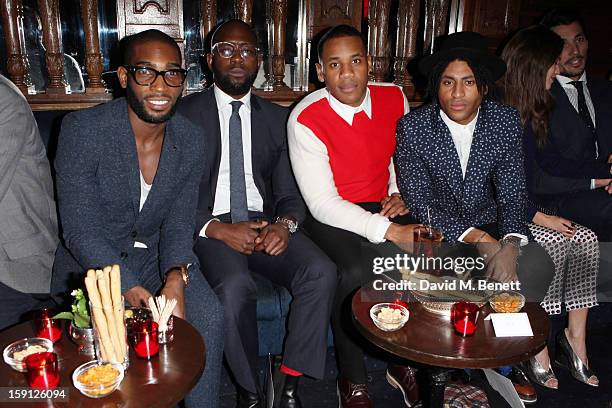 Tinie Tempah and Reggie Yates attend the RAKE AW13 Salon show during the London Collections: MEN AW13 at Tramp, 40 Jermyn St, on January 8, 2012 in...