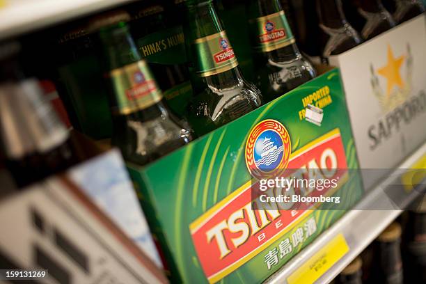 Constellation Brands Inc. Tsingtao beer is displayed for sale at a grocery store in New York, U.S., on Tuesday, Jan. 8, 2013. Constellation Brands...