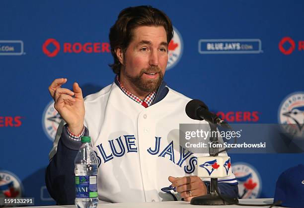 Dickey of the Toronto Blue Jays answers questions from the media as he is introduced at a press conference at Rogers Centre on January 8, 2013 in...