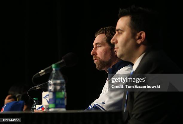 Dickey of the Toronto Blue Jays is introduced at a press conference as general manager Alex Anthopoulos looks on at Rogers Centre on January 8, 2013...