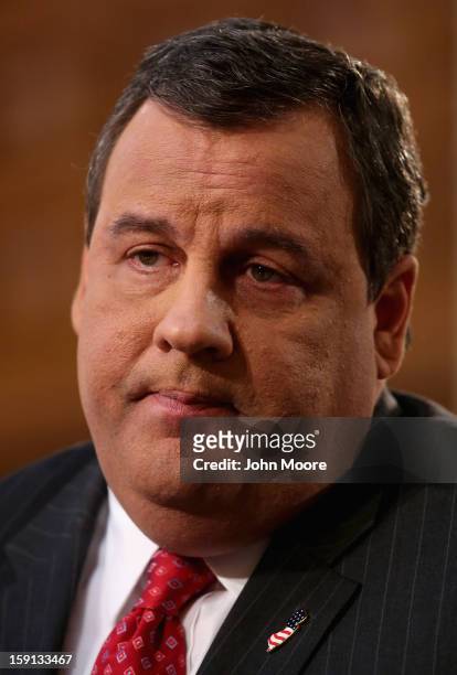New Jersey Governor Chris Christie addresses state legislators during his State of the State Address in the Assembly Chamber at the Statehouse on...