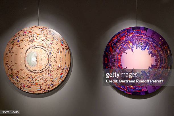 Photographs by Charles Maze are displayed during the 'Sorcieres' exhibition preview at Galerie Pierre Passebon on January 8, 2013 in Paris, France.