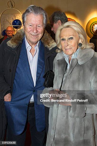 Banker Bruno Roger and Micheline Mauss attend the 'Sorcieres' exhibition preview at Galerie Pierre Passebon on January 8, 2013 in Paris, France.