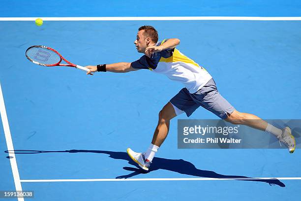 Philipp Kohlschreiber of Germany plays a forehand in his second round match against Alejandro Falla of Colombia during day three of the Heineken Open...