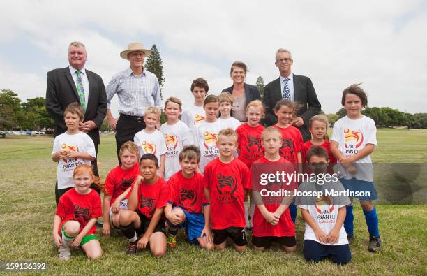 Michael Brown, Peter Garrett, Kate Lundy and David Gallop poses for a photograph with kids during a press conference at Queen's Park on January 9,...