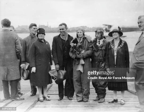 Amelia Earhart at Southampton in 1928 with Stultz and Gordon.